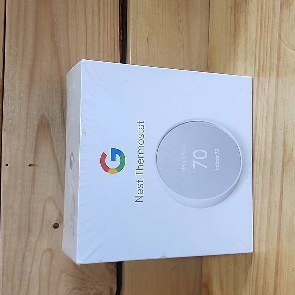 Minimalist White Box with Colorful Logo and Textured Detail